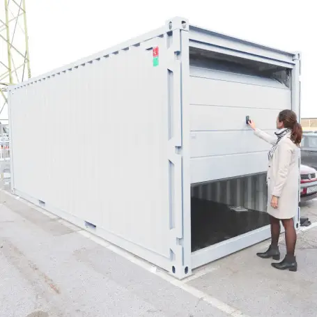 container-de-stockage-20-pieds-avec-porte-garage.webp Container de stockage de 20 Pieds avec Ouverture « Porte Garage Sectionnelle »
